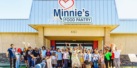 People gathered outside Minnie’s Food Pantry